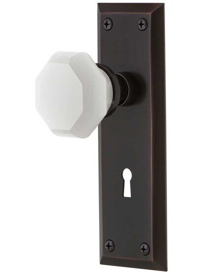 New York Door Set with Keyhole and Milk White Waldorf Crystal Glass Knobs in Timeless Bronze.